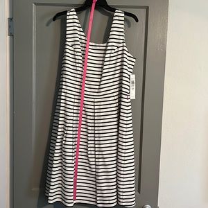 Super cute flat black and white striped dress with pink belt